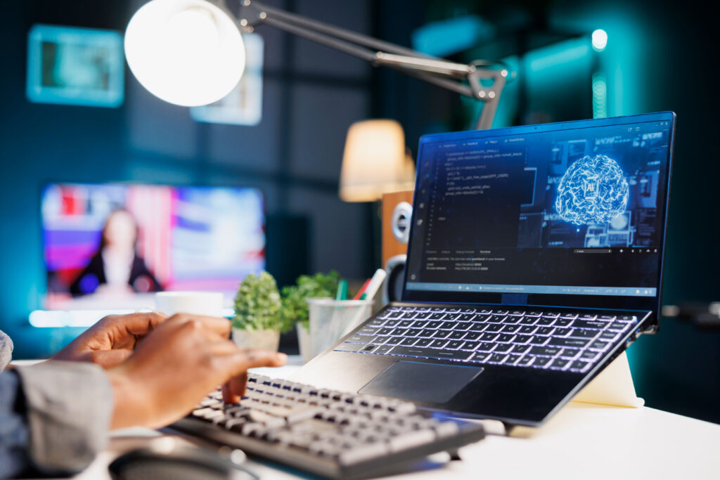 Laptop screen with high-tech look and graphical representation of the human brain