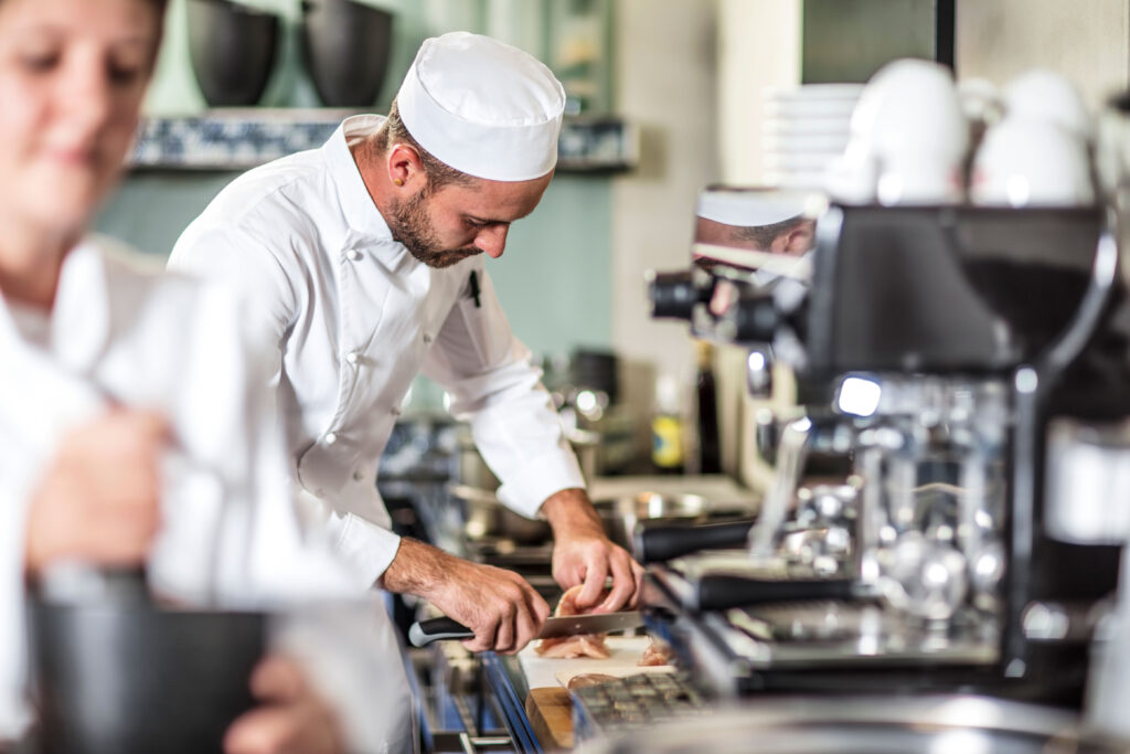 Chef preparing food in a commercial restaurant