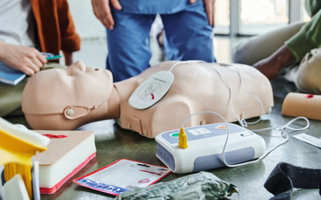 CPR Training Dummy with AED Defibrilator